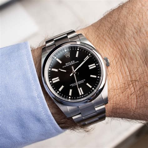 rolex oyster perpetual gold black dial|rolex oyster perpetual 41 black.